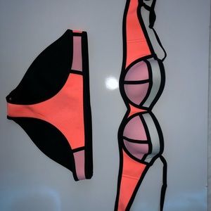 I am selling an adult small Triangl bikini.